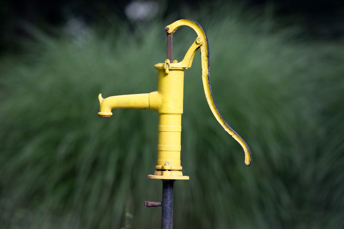 Yellow well water spigot